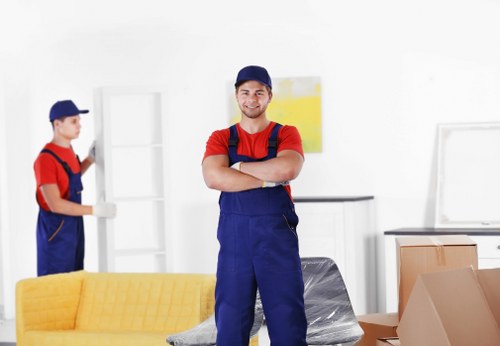 Removal van and team preparing a same day move in Ealing