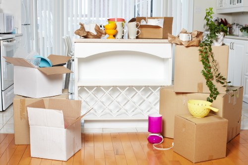 Ealing moving truck loading boxes and household items