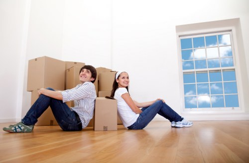Careful boxing and labelling of household items during a move