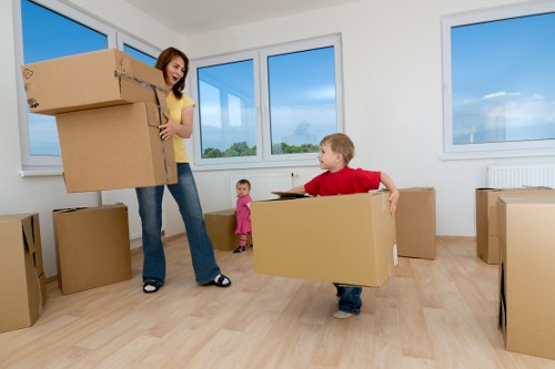 Furniture being carried during a residential move in Ealing