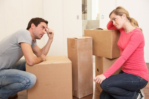 Unpacking boxes and organising rooms after a move in Ealing