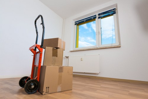 Packed moving boxes ready for transport in West London