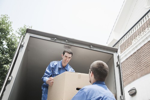 Insured removal specialists handling belongings carefully